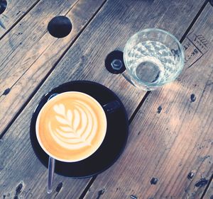 High angle view of cappuccino on table