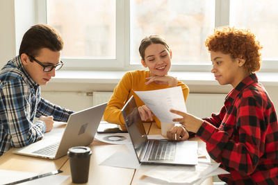 Business colleagues working at office