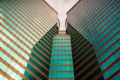 Low angle view of modern building against sky