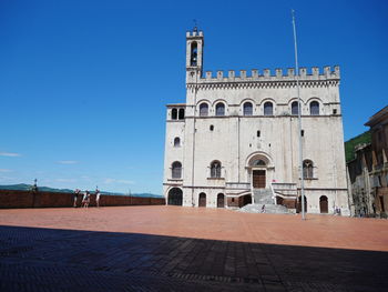 View of historical building against clear blue sky