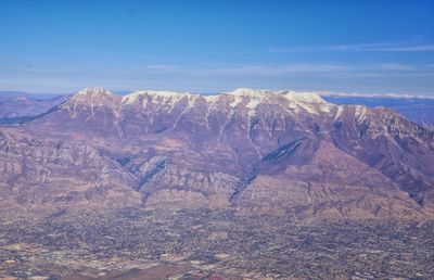 View of mountain range against cloudy sky