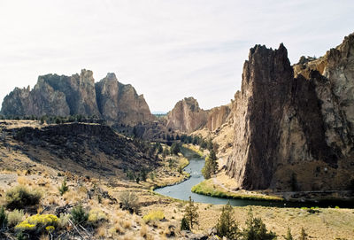 Panoramic view of rocky mountains against sky