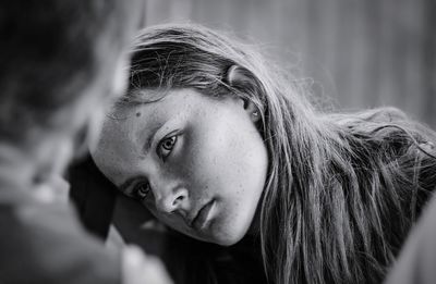 Close-up portrait of young woman