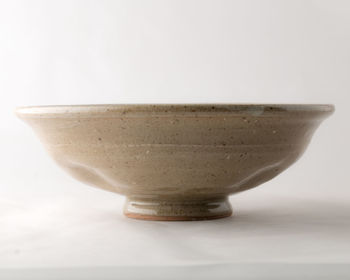 Close-up of empty bowl against white background