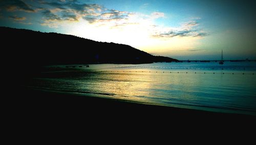 Scenic view of sea at sunset