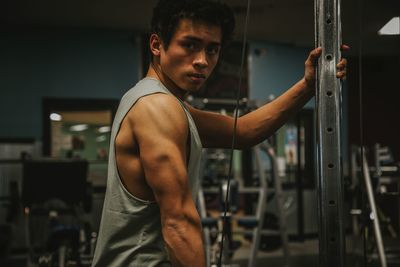 Man exercising in gym