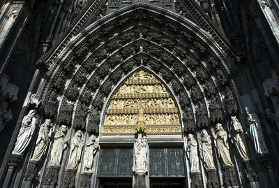 Low angle view of sculpture on building