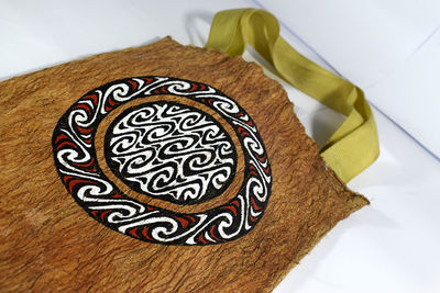 High angle view of multi colored paper on table