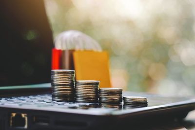 Close-up of coins on table