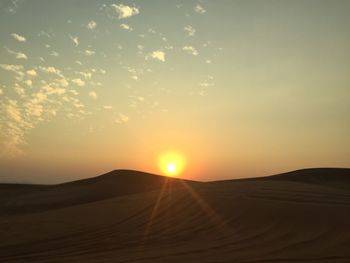 Silhouette of desert during sunset