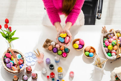 High angle view of multi colored candies on table