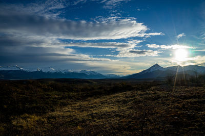 Scenic view of landscape against sky during sunset