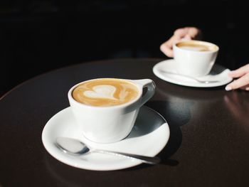 Close-up of coffee cup on table