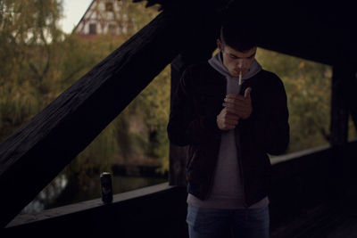 Man holding umbrella