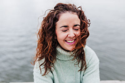 Portrait of smiling young woman