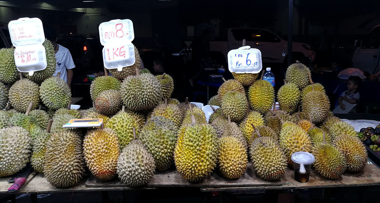 VARIOUS FRUITS FOR SALE AT MARKET