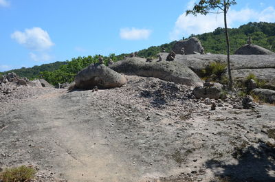 Rocks on land against sky