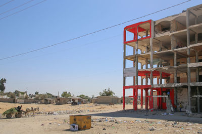 Red built structure against clear blue sky