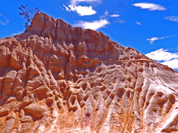 Scenic view of rocky mountains against sky