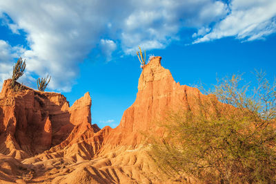 Low angle view of rock formation at tatacoa desert against sky
