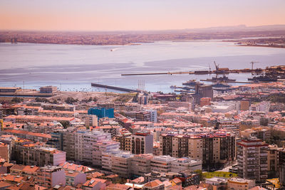 High angle view of buildings against sky during sunset