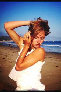 Portrait of woman standing on beach