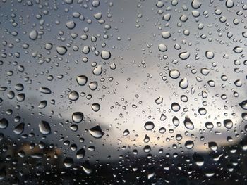 Full frame shot of wet glass window