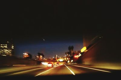 Light trails on road at night