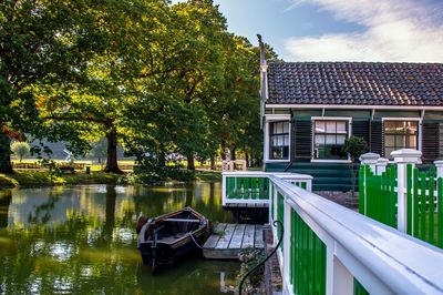 Boats moored in river