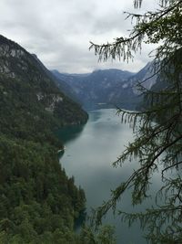 Scenic view of lake and mountains against sky