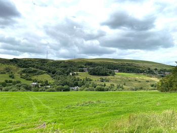 Rural landscape, with extensive fields, farms, trees and hills near, denshaw, oldham, uk