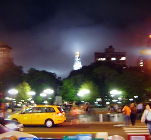 Traffic on city street at night