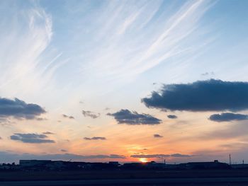 Scenic view of silhouette landscape against sky during sunset