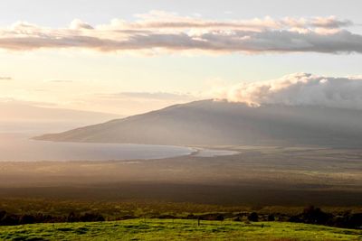 Scenic view of landscape against sky during sunset