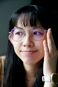 Close-up portrait of young woman