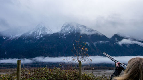 Scenic view of mountains against sky during winter