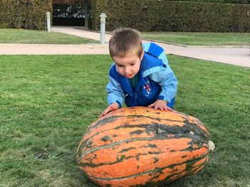 Full length of boy on field