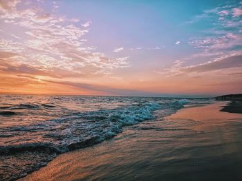 Scenic view of sea against sky during sunset