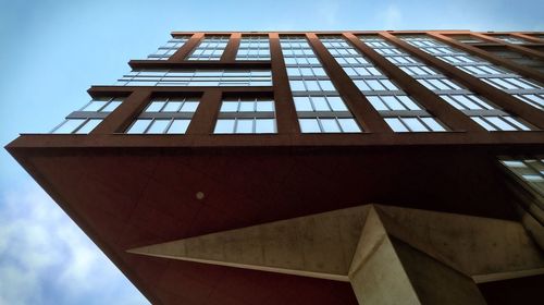 Low angle view of modern building against sky