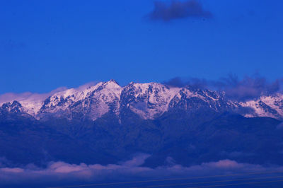 Scenic view of snowcapped mountains against blue sky. gredos