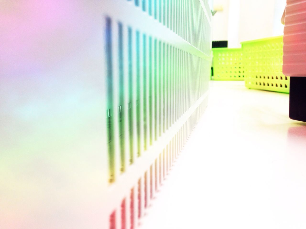 in a row, indoors, multi colored, architecture, built structure, education, no people, repetition, close-up, order, modern, copy space, pattern, building exterior, day, large group of objects, low angle view, book, colorful, green color