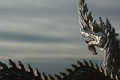 View of bird sculpture against sky