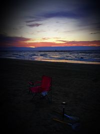 Scenic view of beach against sky during sunset