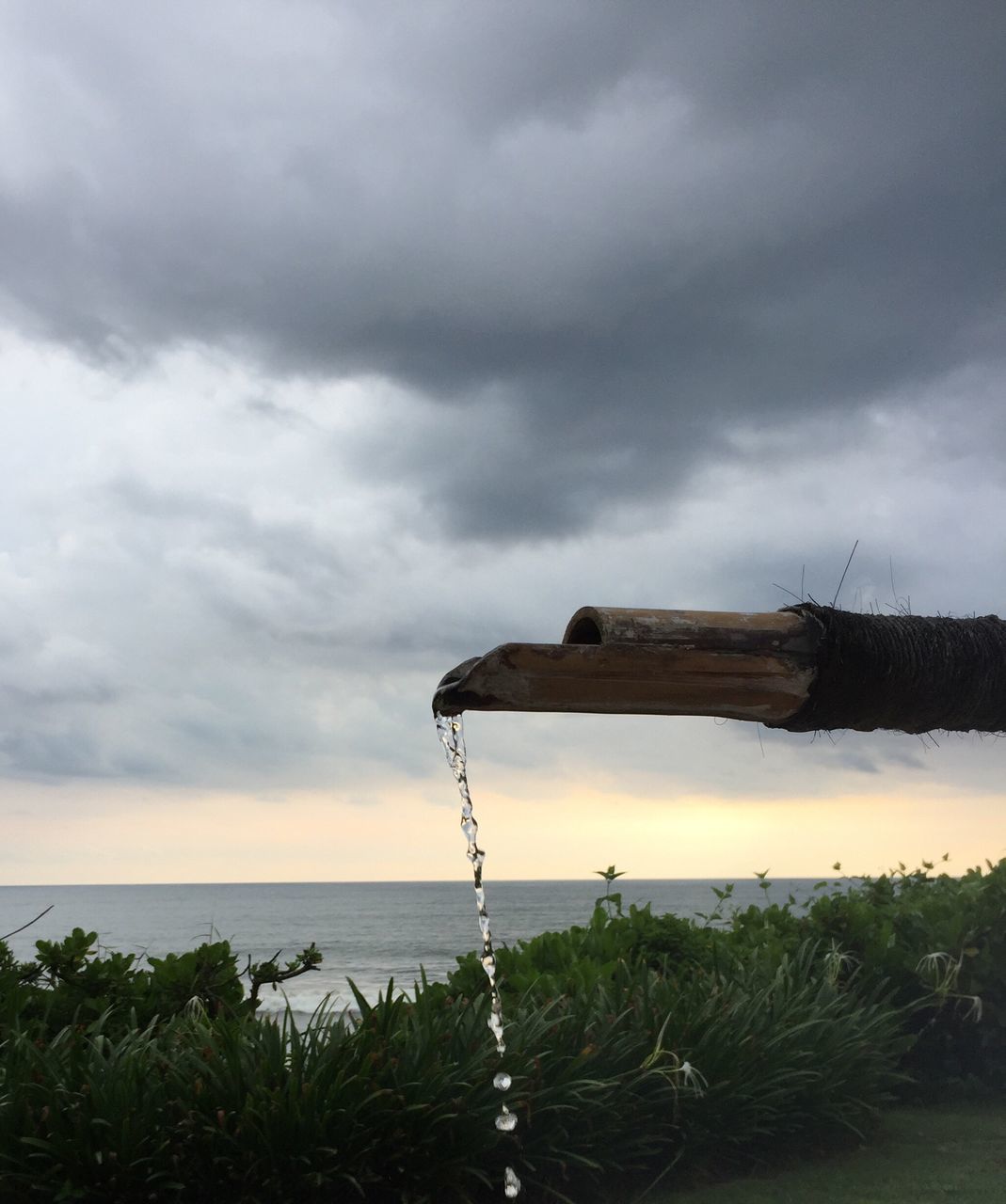 sea, cloud - sky, overcast, nature, storm cloud, sky, horizon over water, water, beauty in nature, outdoors, no people, dramatic sky, scenics, beach, storm, thunderstorm, day