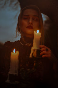 Close-up of illuminated candle