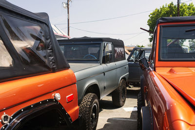 A view of vintage suv cars in a parking lot in venice, california