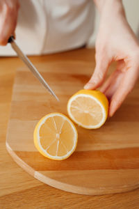 Close-up of man preparing food on table