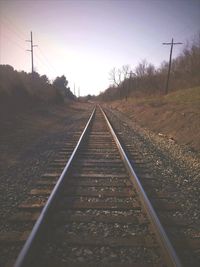 Railroad tracks against clear sky