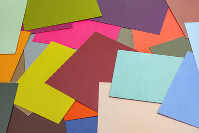 High angle view of multi colored adhesive notes