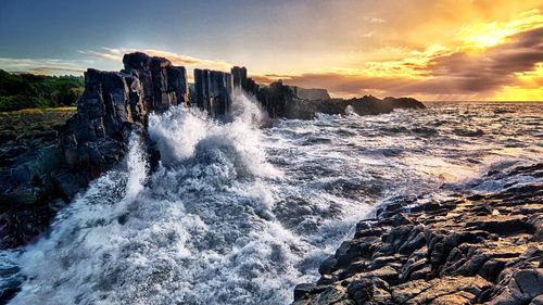 Scenic view of sea against sky during sunset